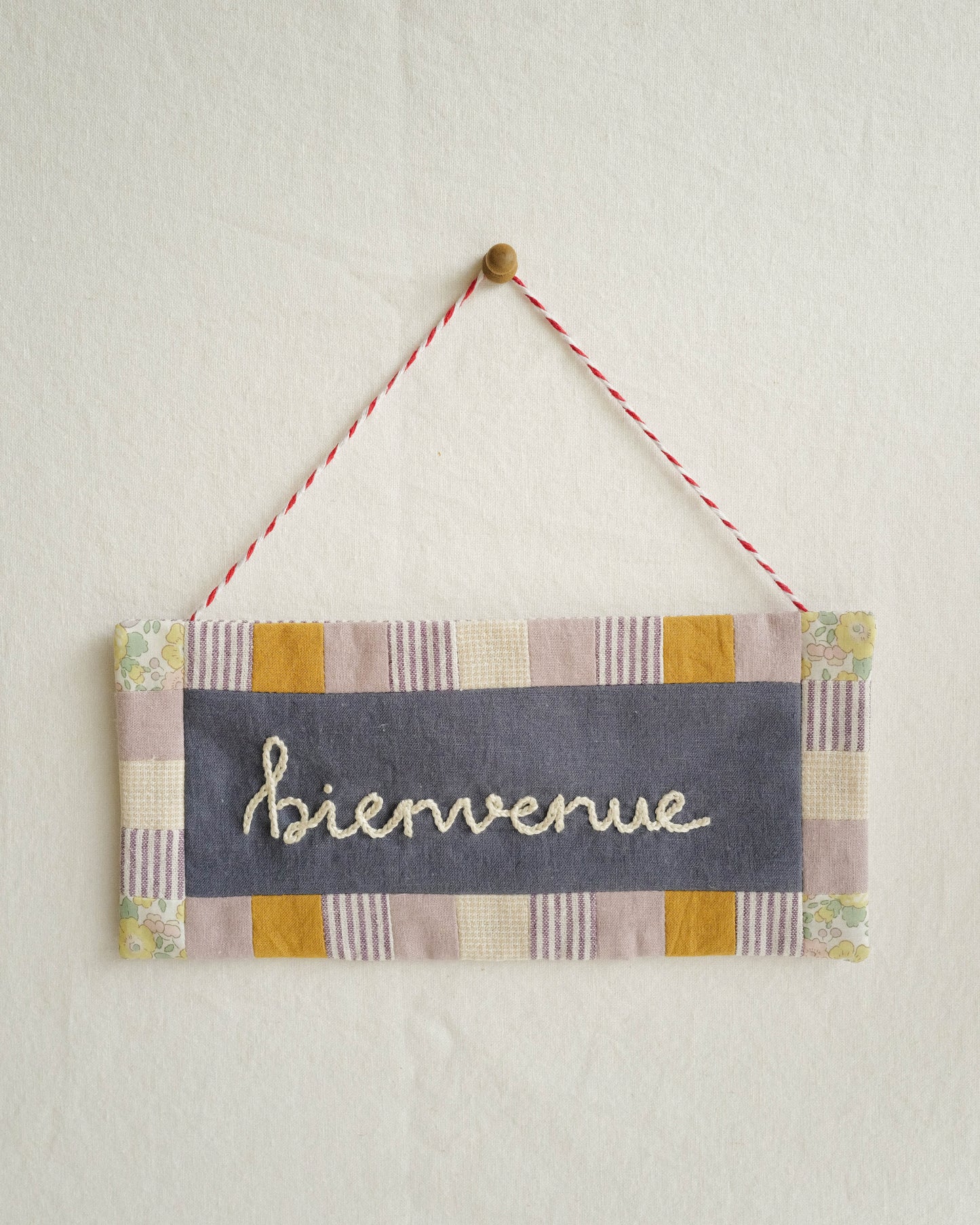 Fabric Sign: bienvenue
